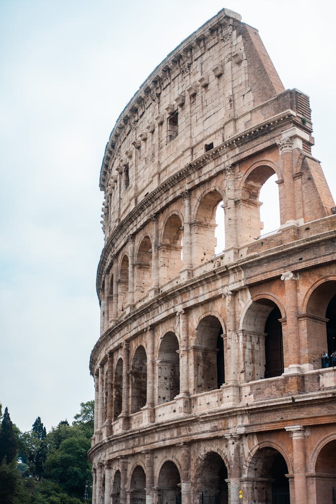 Beautiful view of the ancient Colosseum in Rome, capturing its architectural grandeur and historical significance.