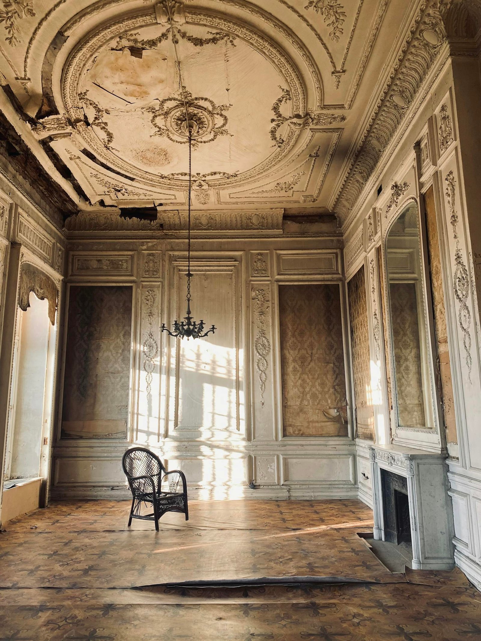 Explore the ornate, vintage interior of an abandoned mansion in Istanbul, with intricate moldings and classic charm.